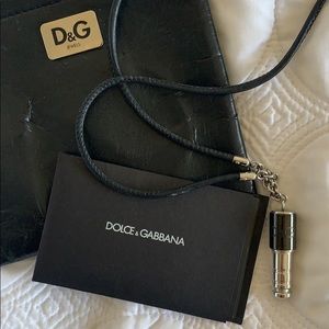 Dolce & Gabbana brand amp plug necklace.